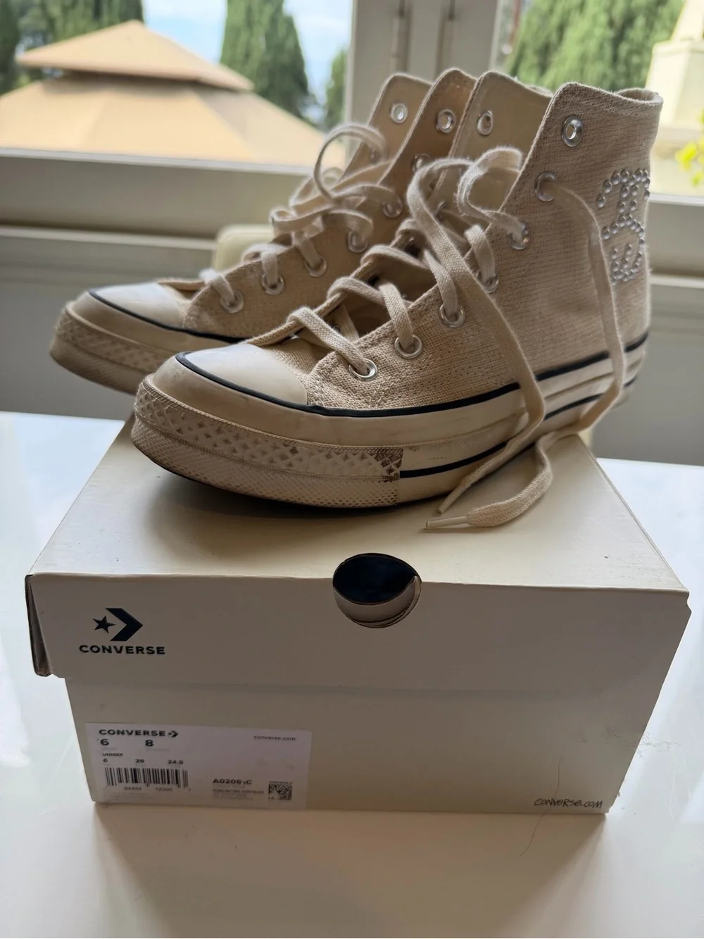 Converse High Top Sneakers in Cream with Black Trim and Rhinestone Star